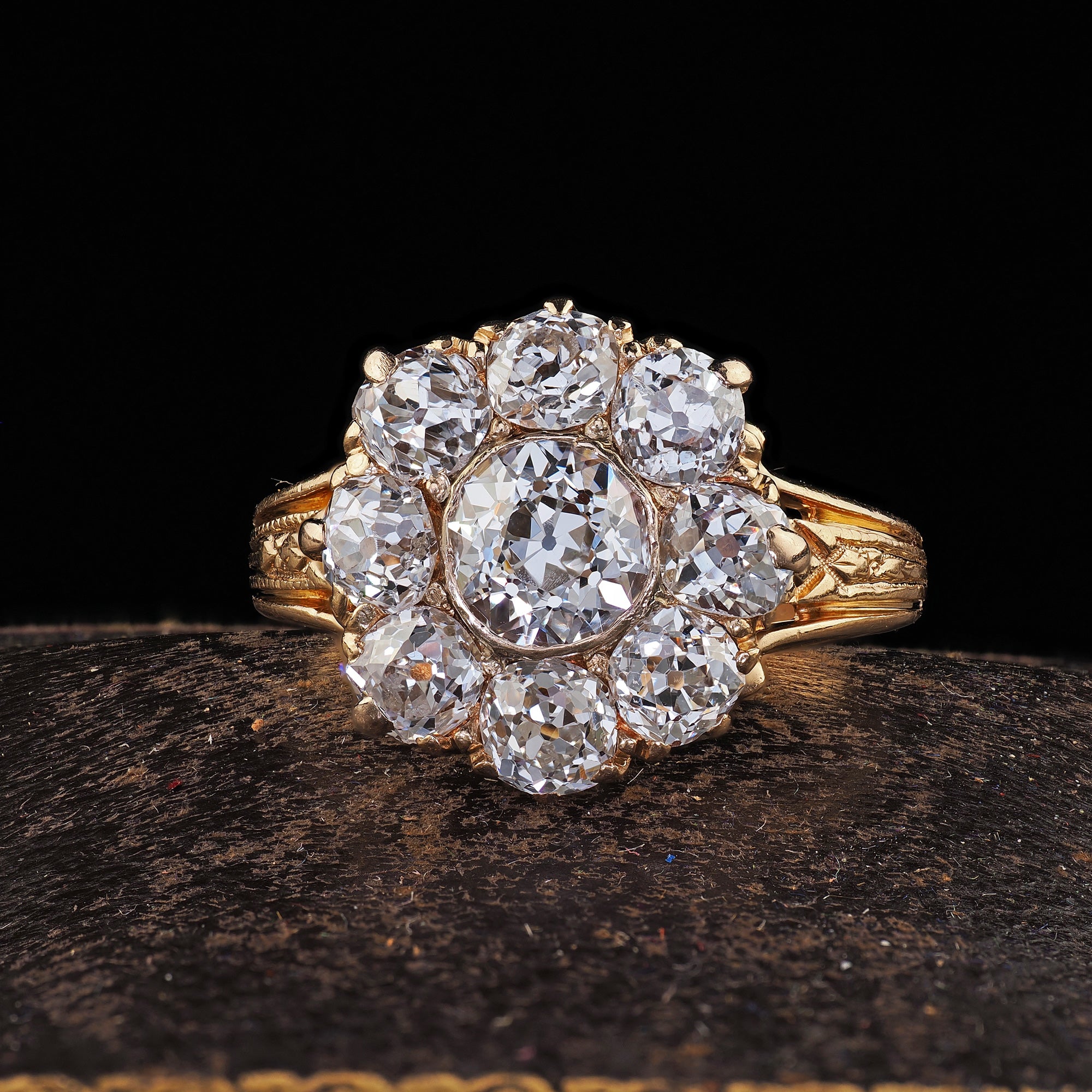 Why should I choose an antique engagement ring over a modern one?