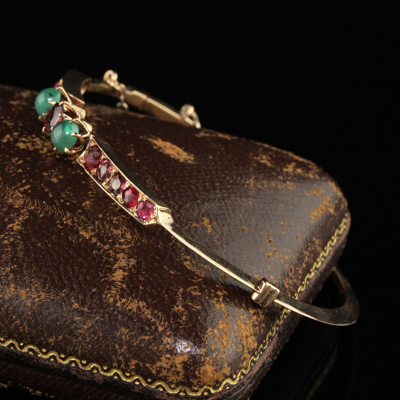 Antique Victorian 15K Yellow Gold Garnet and Emerald Bangle Bracelet