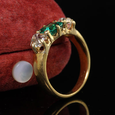 Antique Victorian 18K Yellow Gold Peruzzi Cut Diamond Emerald Three Stone Ring