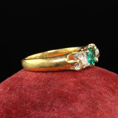 Antique Victorian 18K Yellow Gold Peruzzi Cut Diamond Emerald Three Stone Ring