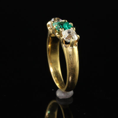 Antique Victorian 18K Yellow Gold Peruzzi Cut Diamond Emerald Three Stone Ring