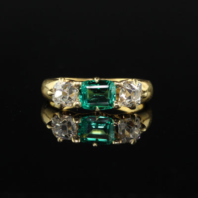 Antique Victorian 18K Yellow Gold Peruzzi Cut Diamond Emerald Three Stone Ring