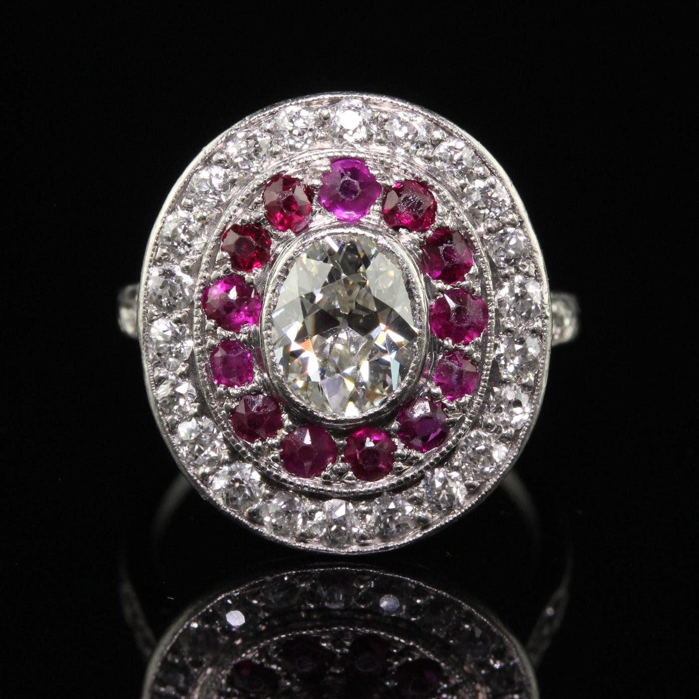 Antique Edwardian Platinum Old Mine Oval Diamond and Ruby Engagement Ring