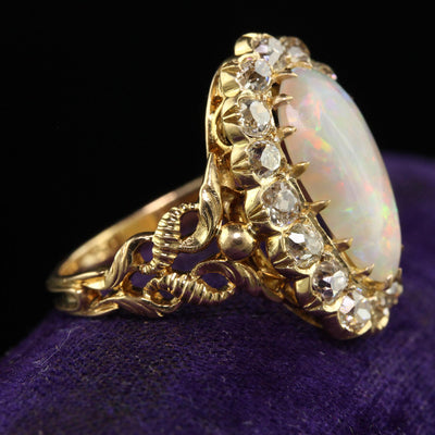 Antique Victorian 18K Yellow Gold Natural Australian Opal Diamond Halo Ring