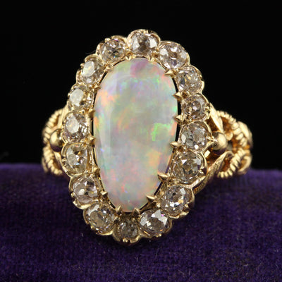 Antique Victorian 18K Yellow Gold Natural Australian Opal Diamond Halo Ring