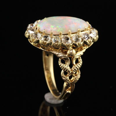 Antique Victorian 18K Yellow Gold Natural Australian Opal Diamond Halo Ring