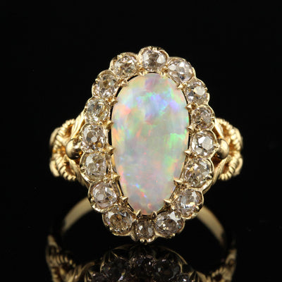 Antique Victorian 18K Yellow Gold Natural Australian Opal Diamond Halo Ring