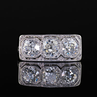 Antique Art Deco Jung & Klitz Platinum Old Mine Cut Diamond Three Stone Ring