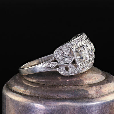 Antique Art Deco Platinum Old Mine Diamond Three Stone Ribbon Motif Ring
