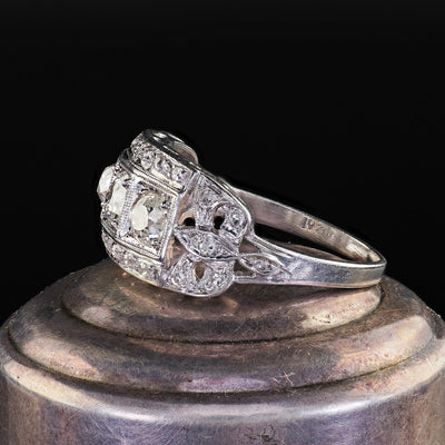 Antique Art Deco Platinum Old Mine Diamond Three Stone Ribbon Motif Ring
