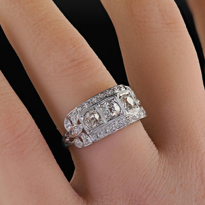 Antique Art Deco Platinum Old Mine Diamond Three Stone Ribbon Motif Ring