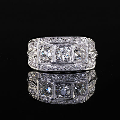 Antique Art Deco Platinum Old Mine Diamond Three Stone Ribbon Motif Ring