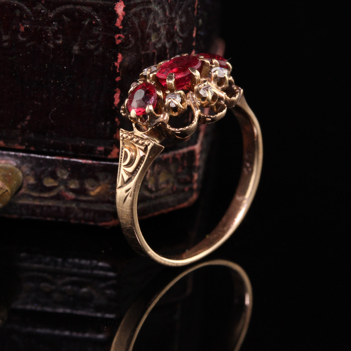 Antique Victorian 12K Rose Gold Ruby and Diamond Three Stone Ring