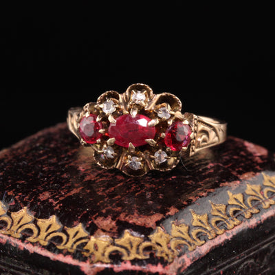 Antique Victorian 12K Rose Gold Ruby and Diamond Three Stone Ring