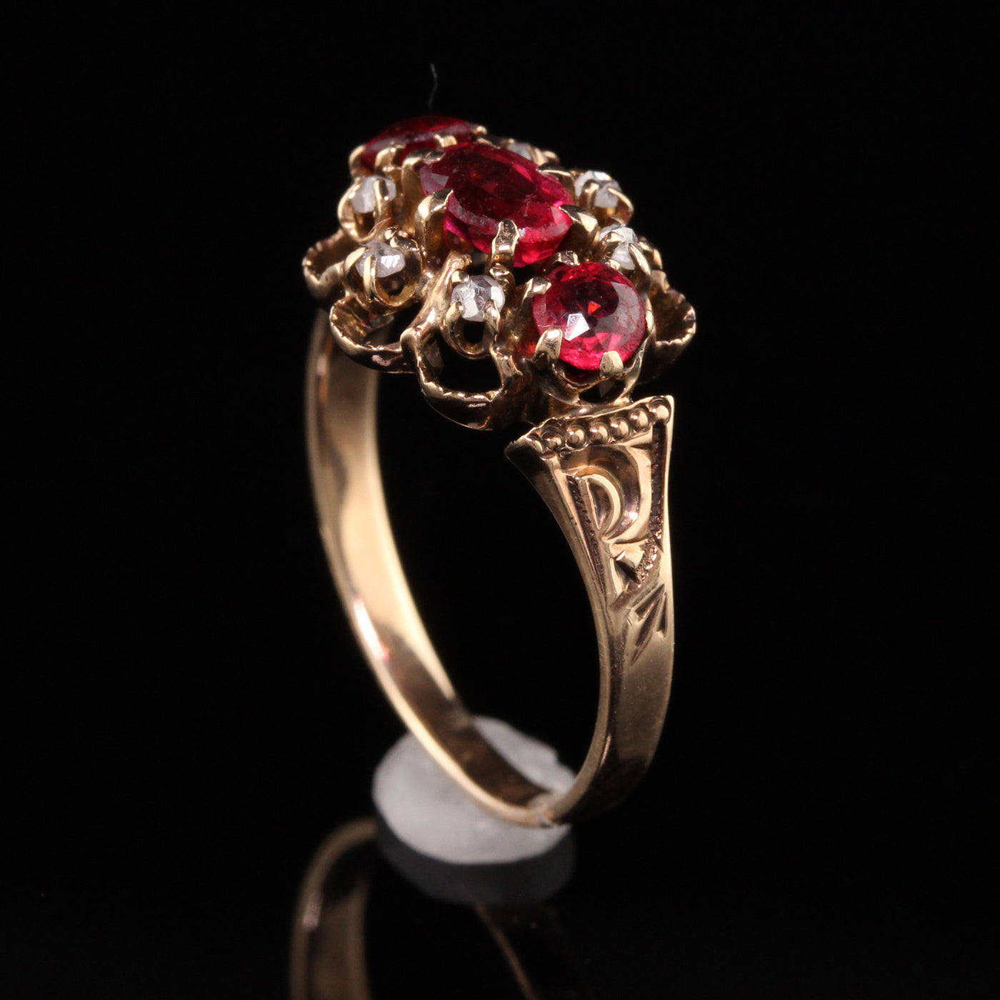 Antique Victorian 12K Rose Gold Ruby and Diamond Three Stone Ring