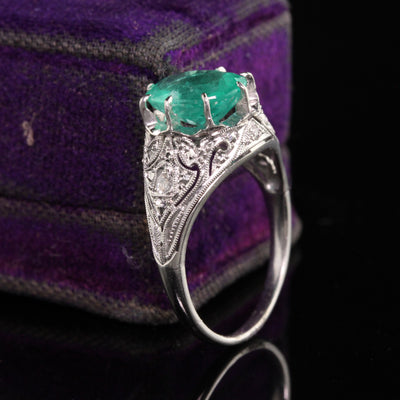 Antique Art Deco Platinum Emerald and Diamond Engagement Ring