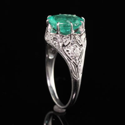 Antique Art Deco Platinum Emerald and Diamond Engagement Ring