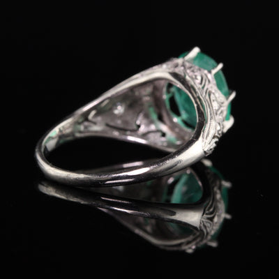 Antique Art Deco Platinum Emerald and Diamond Engagement Ring