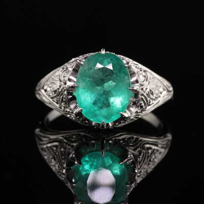 Antique Art Deco Platinum Emerald and Diamond Engagement Ring