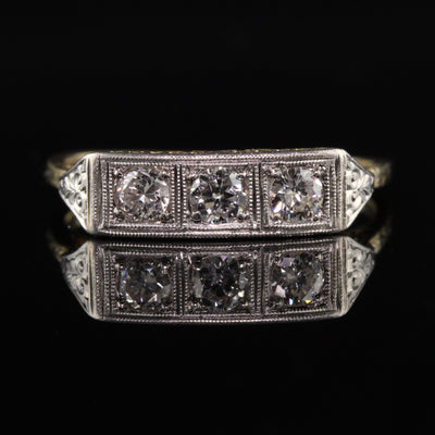 Antique Art Deco 18K Yellow Gold and Platinum Three Diamond Filigree Ring