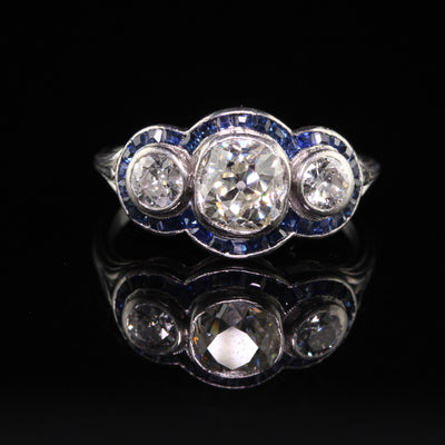 Antique Art Deco Platinum Old Mine Diamond and Sapphire Three Stone Ring
