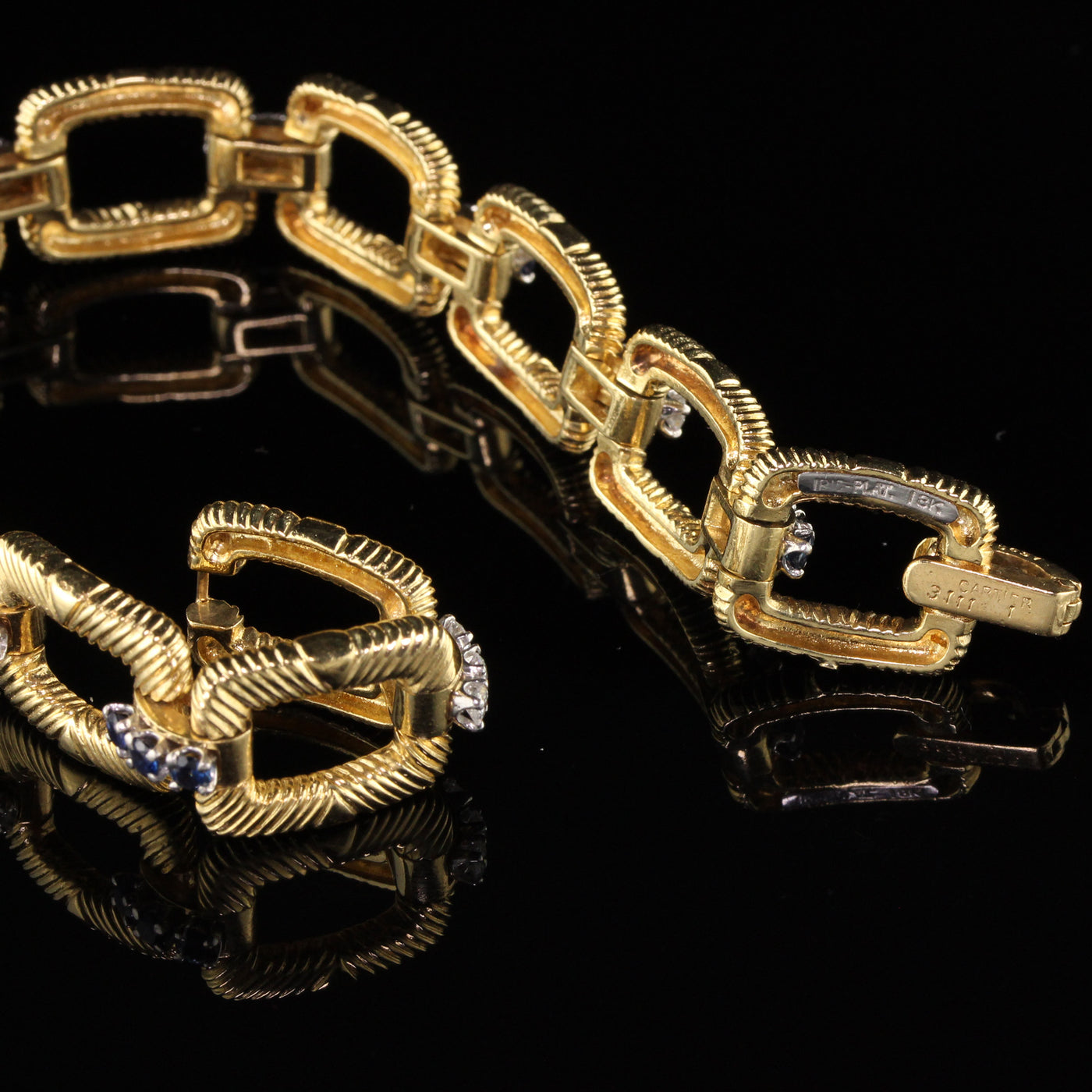 Cartier Platinum and 18 Karat Yellow Gold Diamond and Sapphire Bracelet
